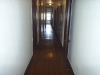 hallway from living room to all other rooms/closets