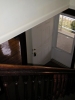 down the stairs to front foyer